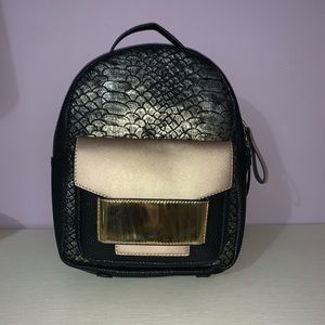 Black and gold backpack